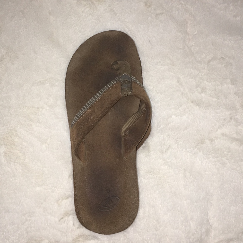 Brown leather slippers